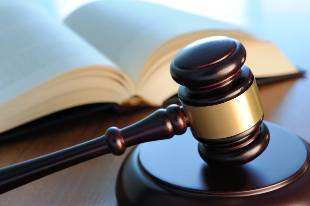 Gavel and book on a table